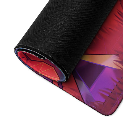 A rolled-up vaporwave neon ghost desktop mouse pad with vibrant red and purple geometric design for gaming desks