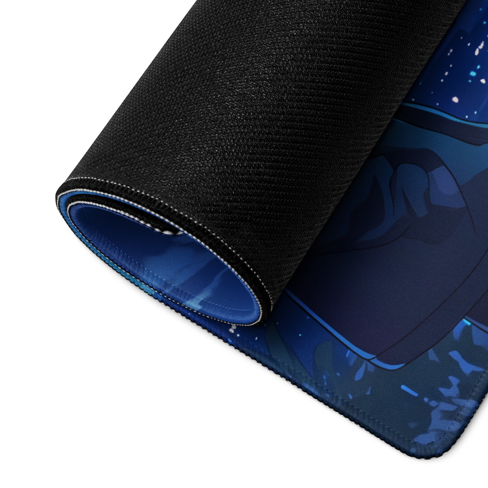 Black textured mouse pad with blue anime style character under starry sky rolled to show inner lining for gaming desk use