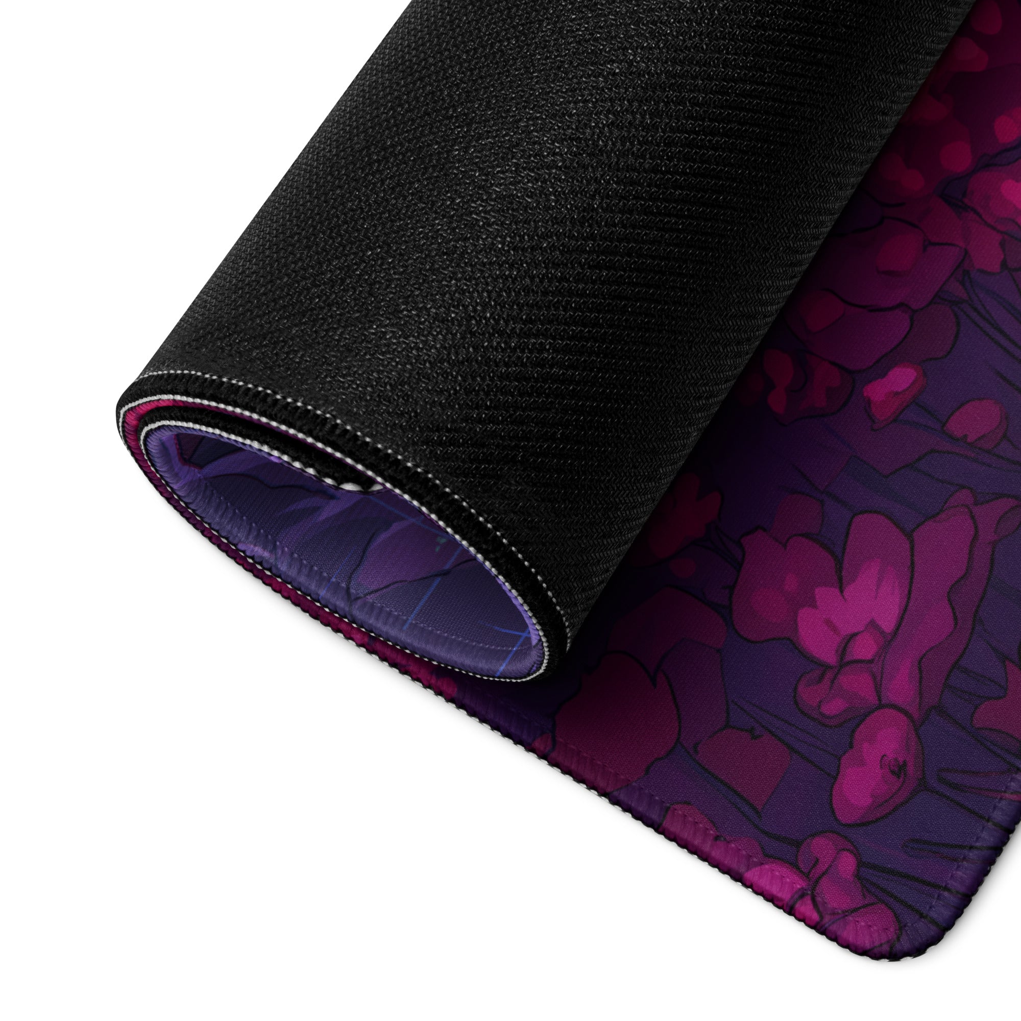 Rolled-up black mousepad with vibrant purple and magenta floral design stitched edges and textured underside vaporwave neon goddess mouse pad
