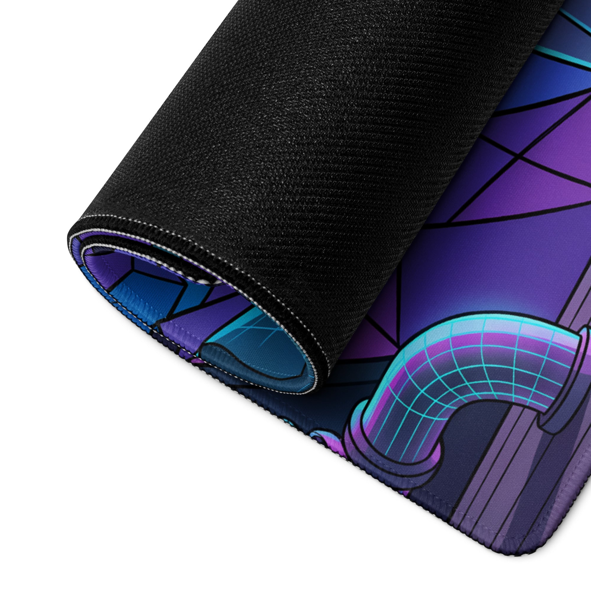 A rolled-up vaporwave neon desk pad with vibrant purple teal cyberpunk geometric design and black fabric border