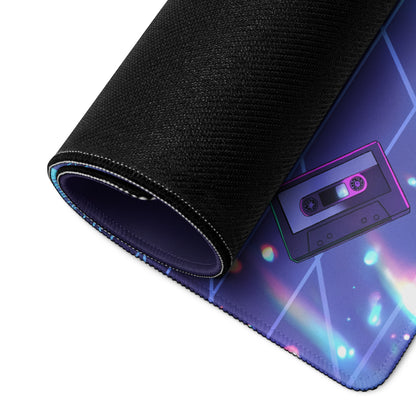 A black rolled-up gaming mousepad with vibrant purple and blue neon vaporwave cassette tape design for cyber warriors