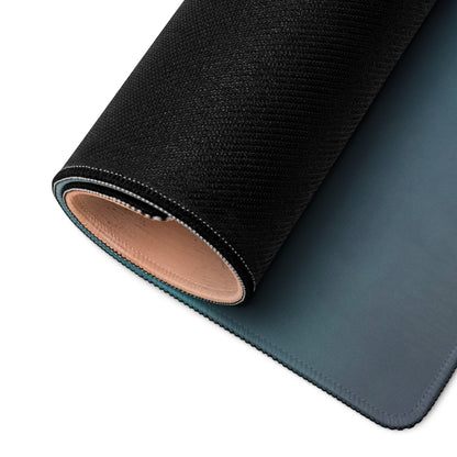Subaru brz inspired world rally blue bronze rim desk pad showing black textured outer layer and tan leather interior rolled to reveal dark teal surface
