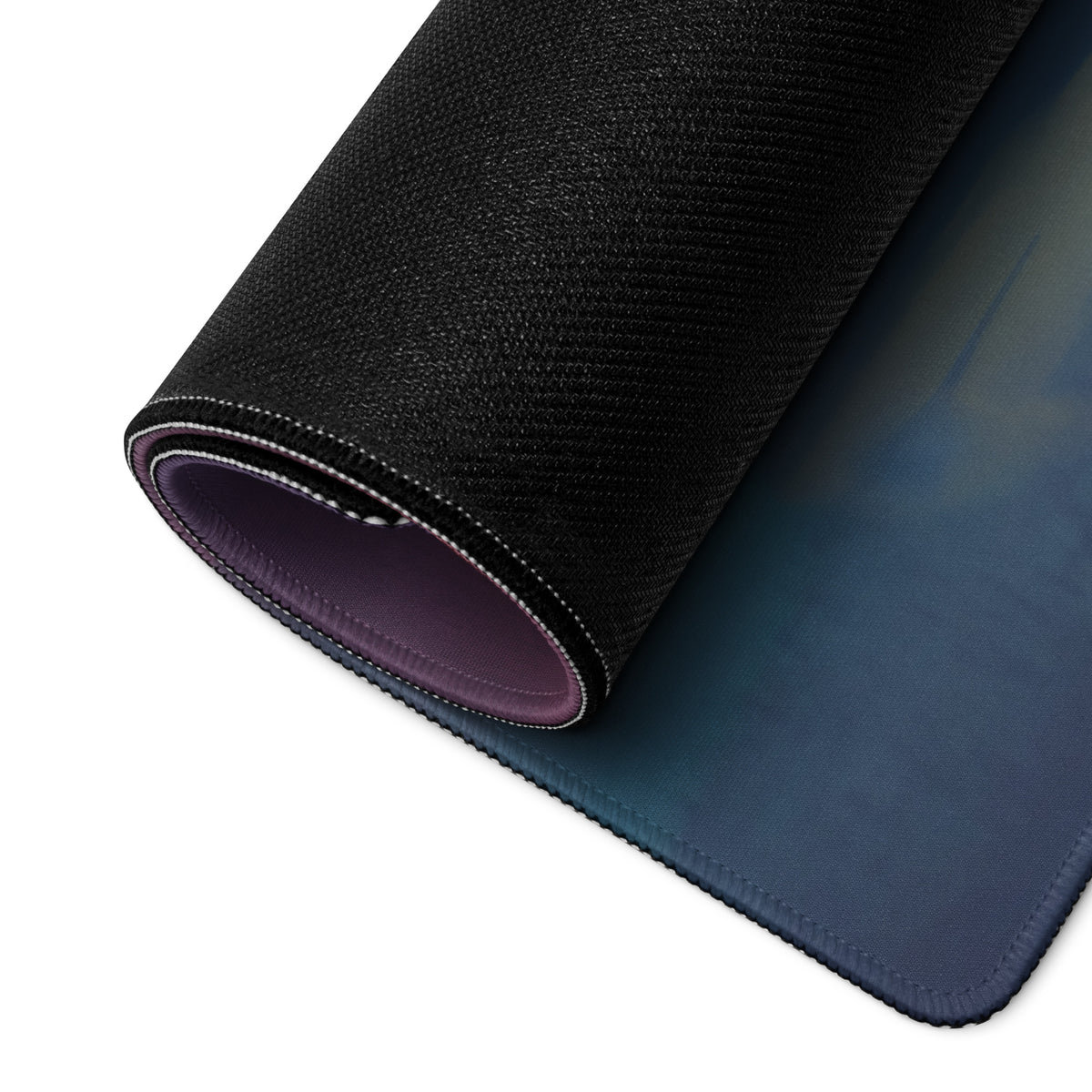 Black textured lamborghini revuelto inspired giallo desk pad with blue gradient underside and stitched edges
