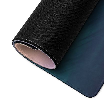 Black and teal gradient gaming mousepad with textured outer surface and stitched edges for high dpi precision
