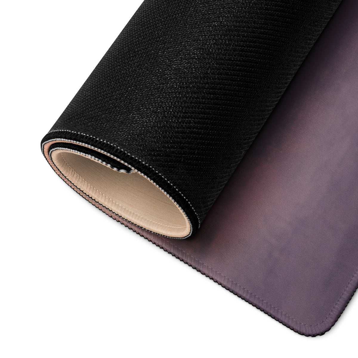 Rolled-up bugatti chiron inspired silver apex xl gaming mousepad with black textured outer layer and smooth purple inner surface