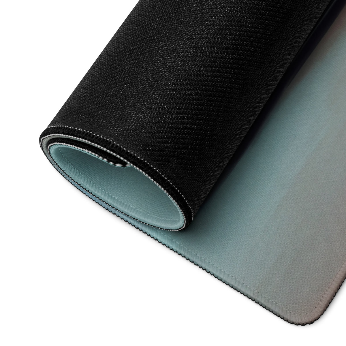 Black textured Acura NSX inspired pearl widebody desk pad with light blue interior lining and ultra-glide stitched edges