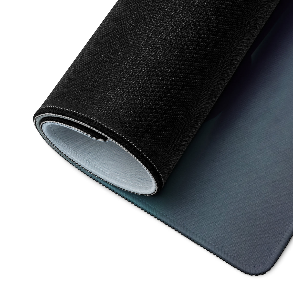 Black textured xl gaming mousepad with smooth gray underside and stitched edges inspired by Lamborghini Huracán