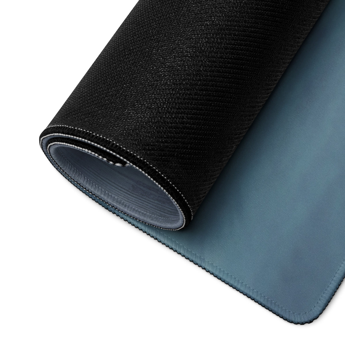 Porsche 911 GT3 inspired stealth shadow desk mat in black and teal with dual-sided textured fabric and smooth surface interior