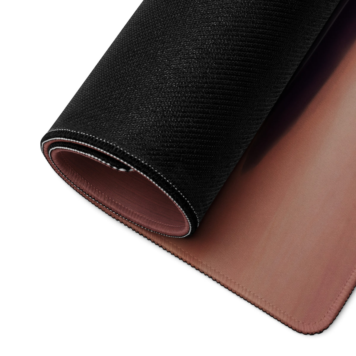 Bugatti chiron inspired silver horizon desk mat with black textured outer layer and tan leather interior rolled to show dual sides