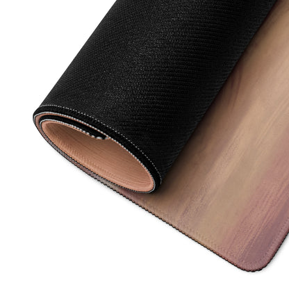 Black textured outer layer with tan leather interior rolled to reveal gradient pink to beige surface of porsche 911 gt3 rs inspired violet accent desk pad
