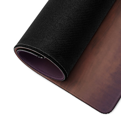 Lamborghini huracán inspired stealth onyx desk pad with black textured outer layer and brown leather interior rolled to show layers