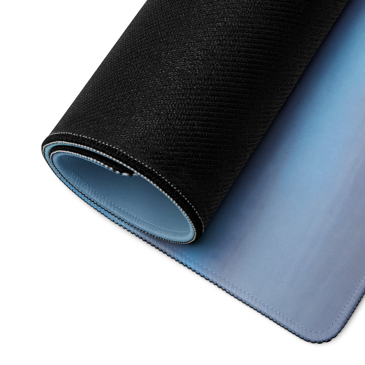 Ferrari 458 inspired stealth matte black desk pad featuring a black and blue gradient textured mousepad with stitched edges