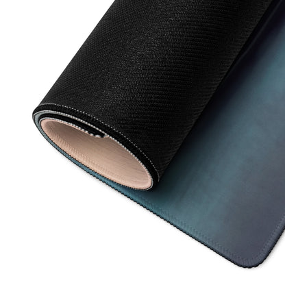 Black textured outer layer with smooth teal inner surface rolled to show layered construction of McLaren Senna inspired British Racing Green desk mat