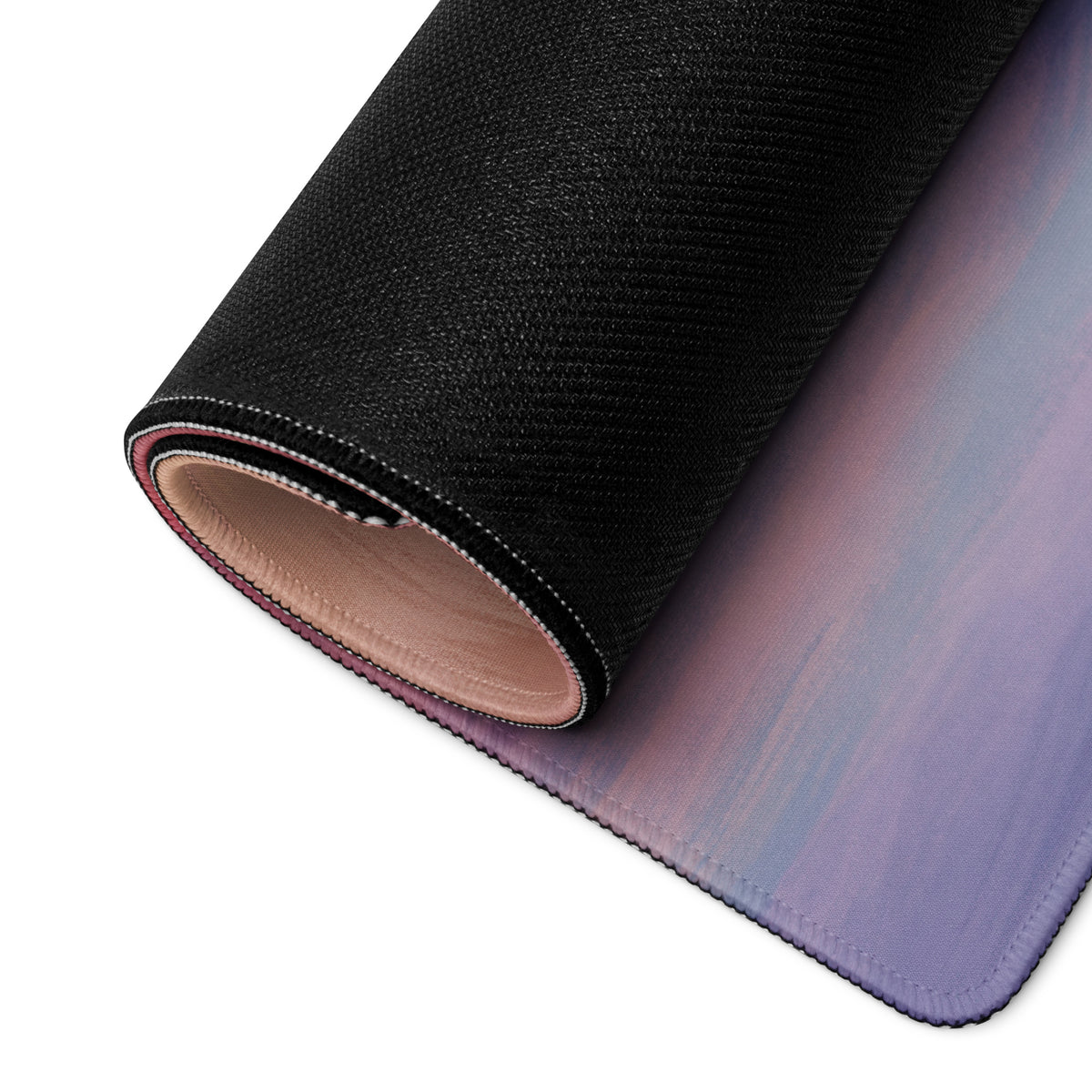 Rolled-up Porsche 911 GT3 inspired viper green desk mat with gradient black purple blue fabric mousepad surface