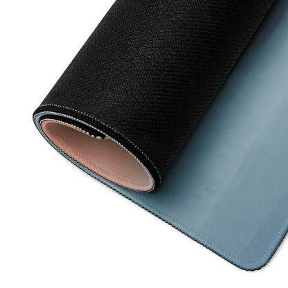Mv agusta superveloce inspired extended desk mat rolled up with black and light blue textured outer surface and smooth lining
