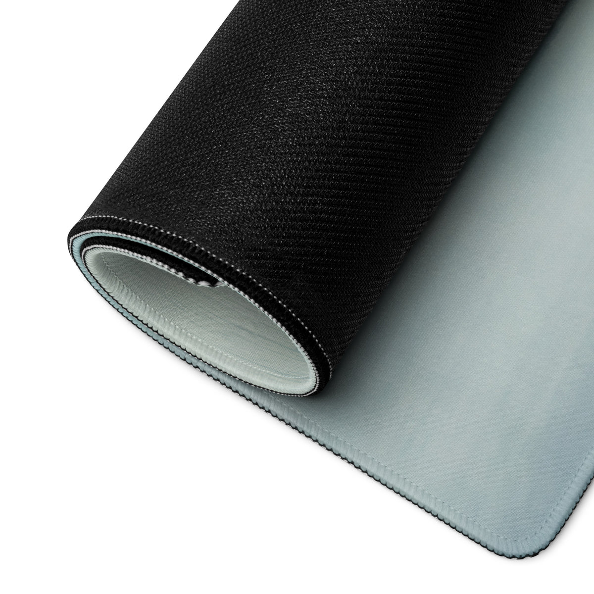 Custom cafe racer premium gaming mousepad with black textured outer layer and light gray smooth inner surface rolled neatly