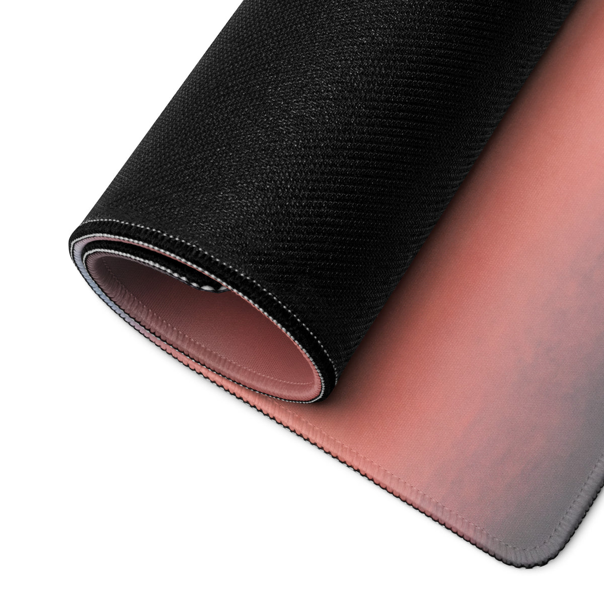 Bmw m1000rr inspired large gaming mousepad with black textured surface pink gradient stitched edges underside shown