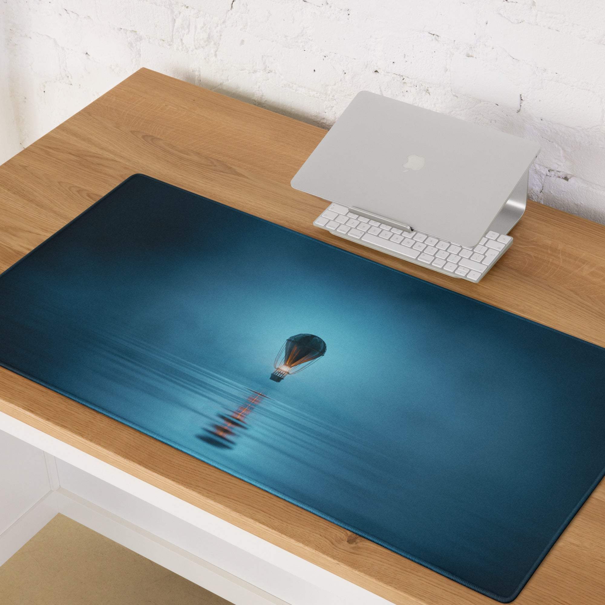 Dreamy ocean blue gaming mouse pad with hot air balloon over water reflection