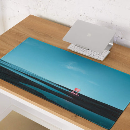 Blue ocean gaming mouse pad with pink lifeguard chair on waves