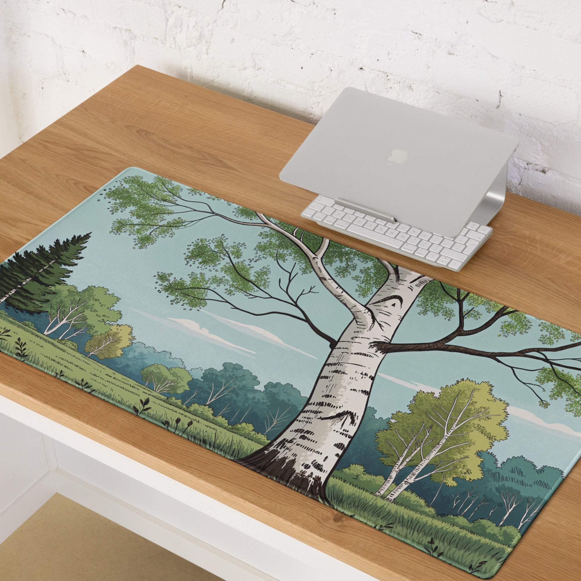 Stylized birch tree gaming mouse pad with green forest scene