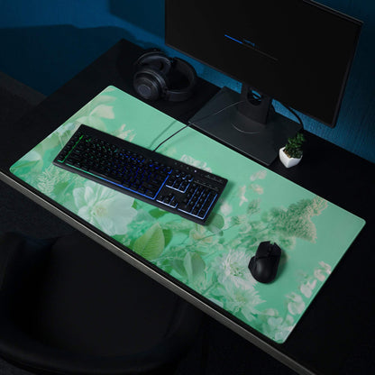 Mint green floral gaming mousepad with sheen, non-slip base, stitched edges