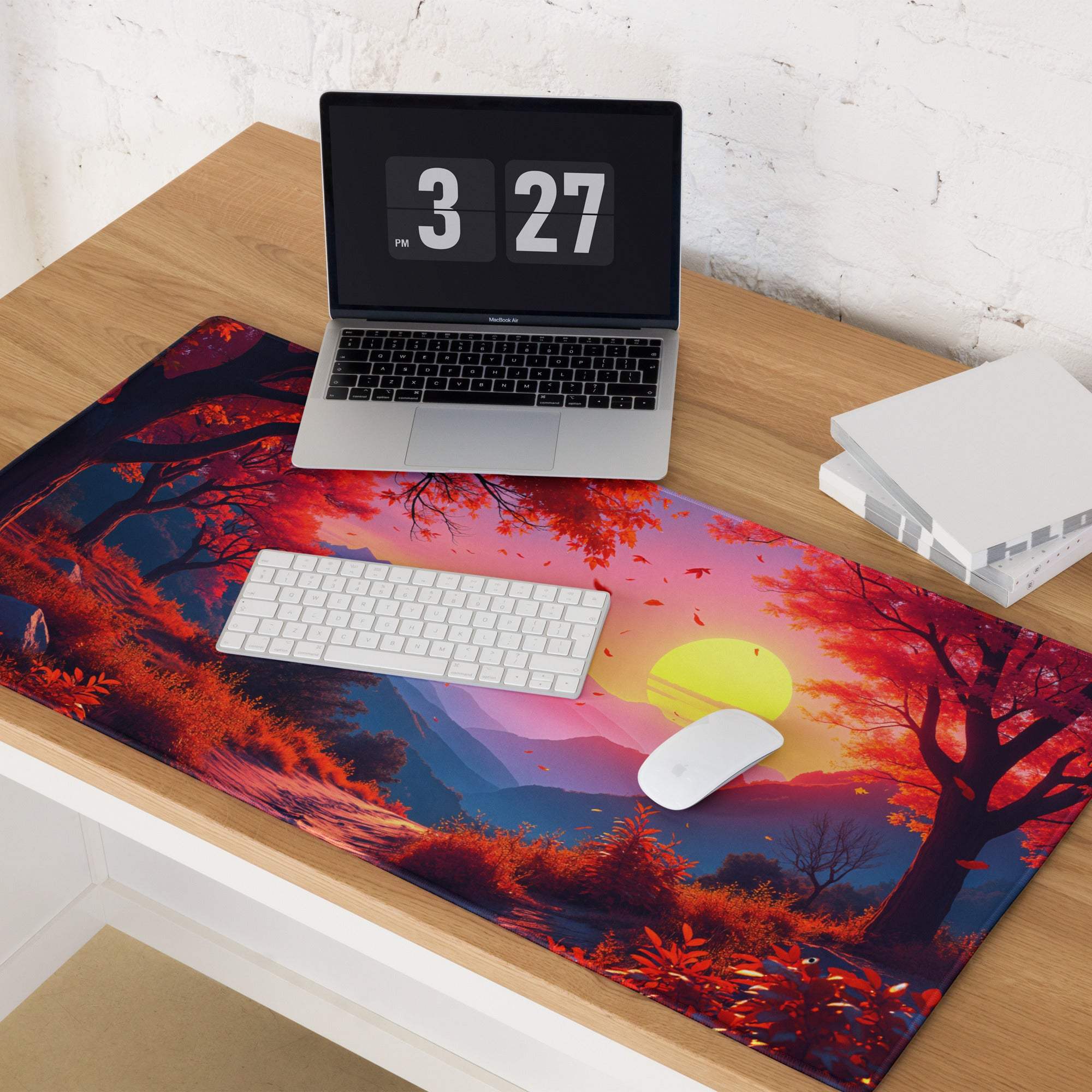 Vibrant red orange autumn forest sunset gaming mousepad on wooden desk
