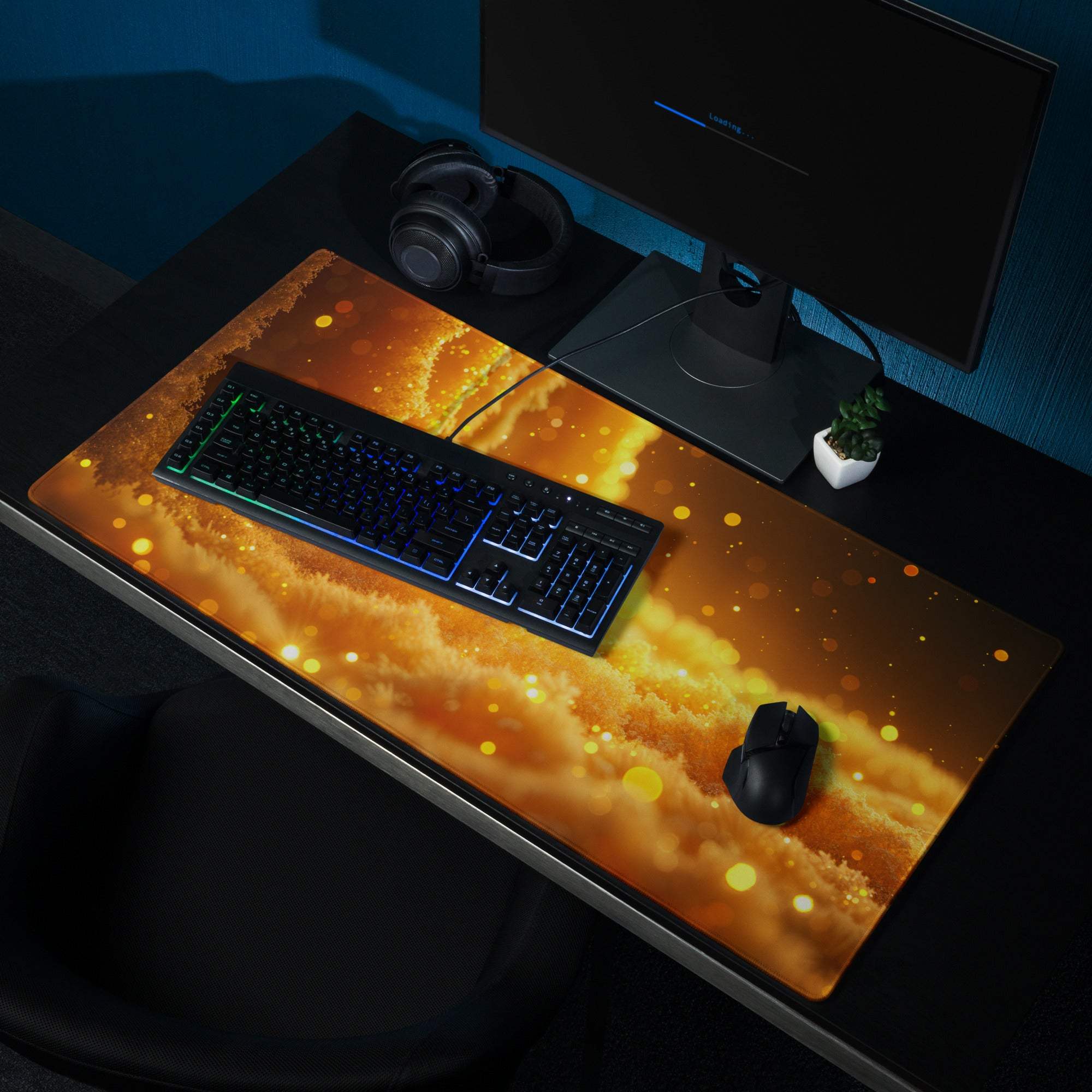 Golden nebula gaming mousepad with warm ember orange glow and glossy finish