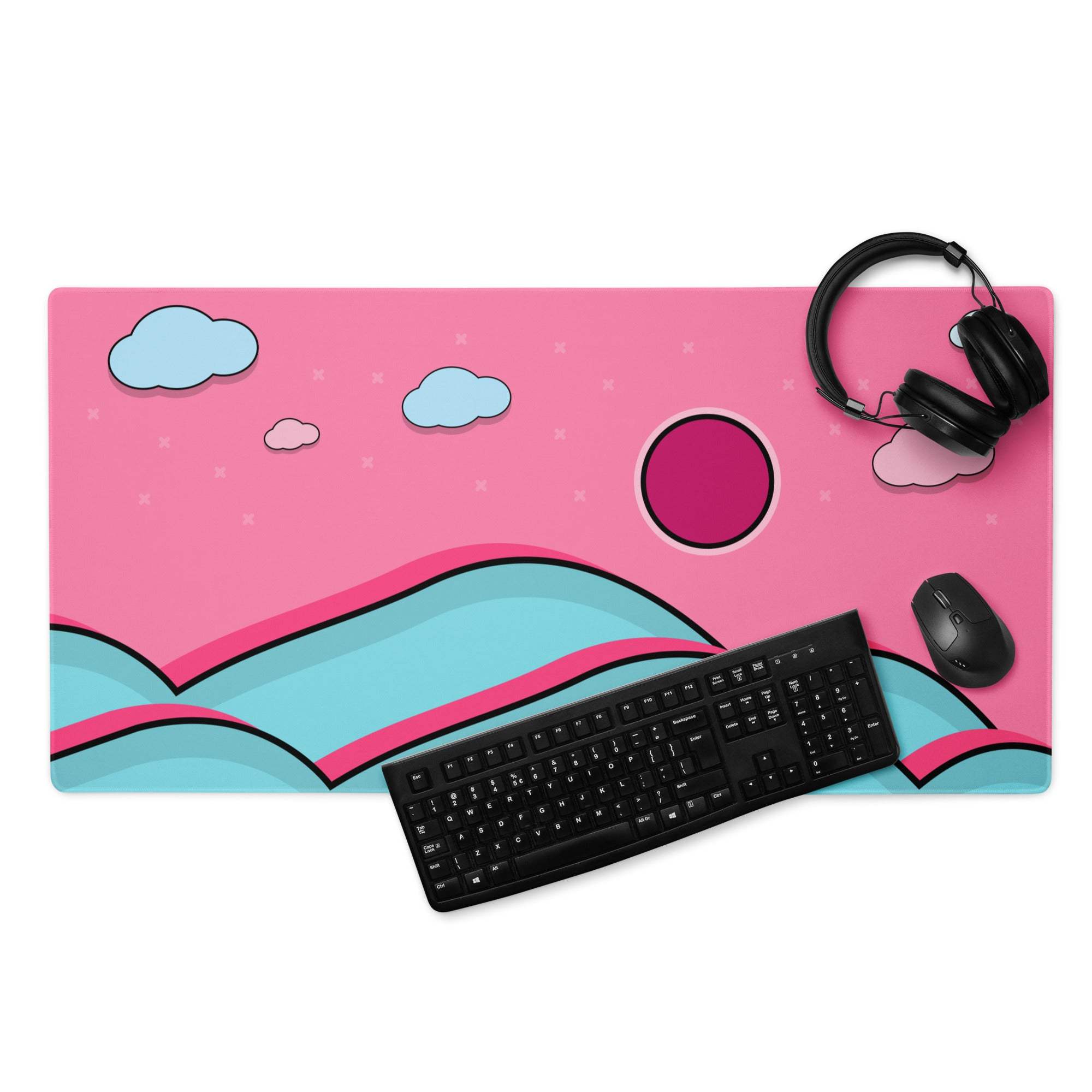 Pink and teal cartoon landscape gaming mouse pad with clouds, hills, magenta sun, non-slip backing, edge stitching