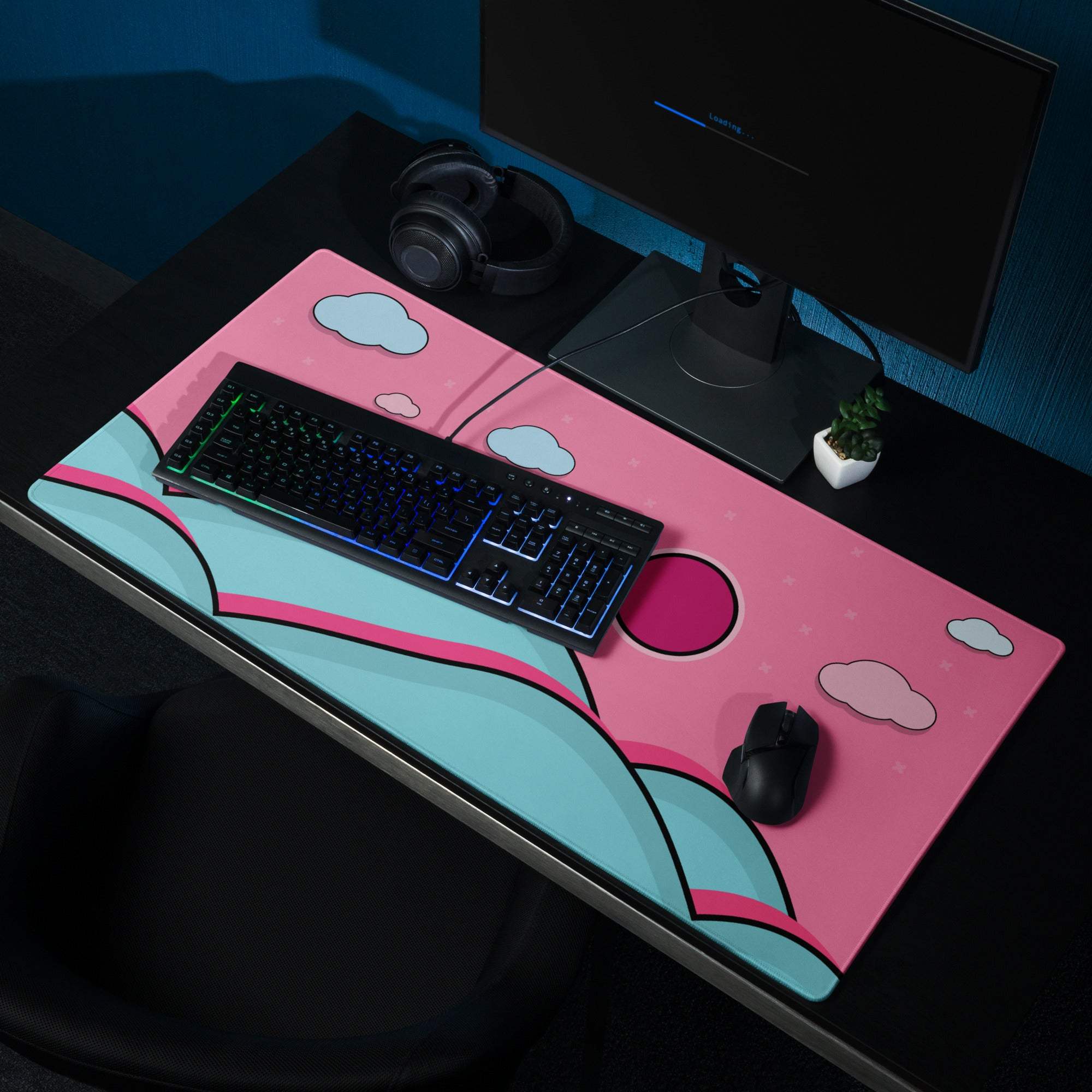 Pink teal cloud gaming mousepad with pink sun, non-slip backing, edge stitching