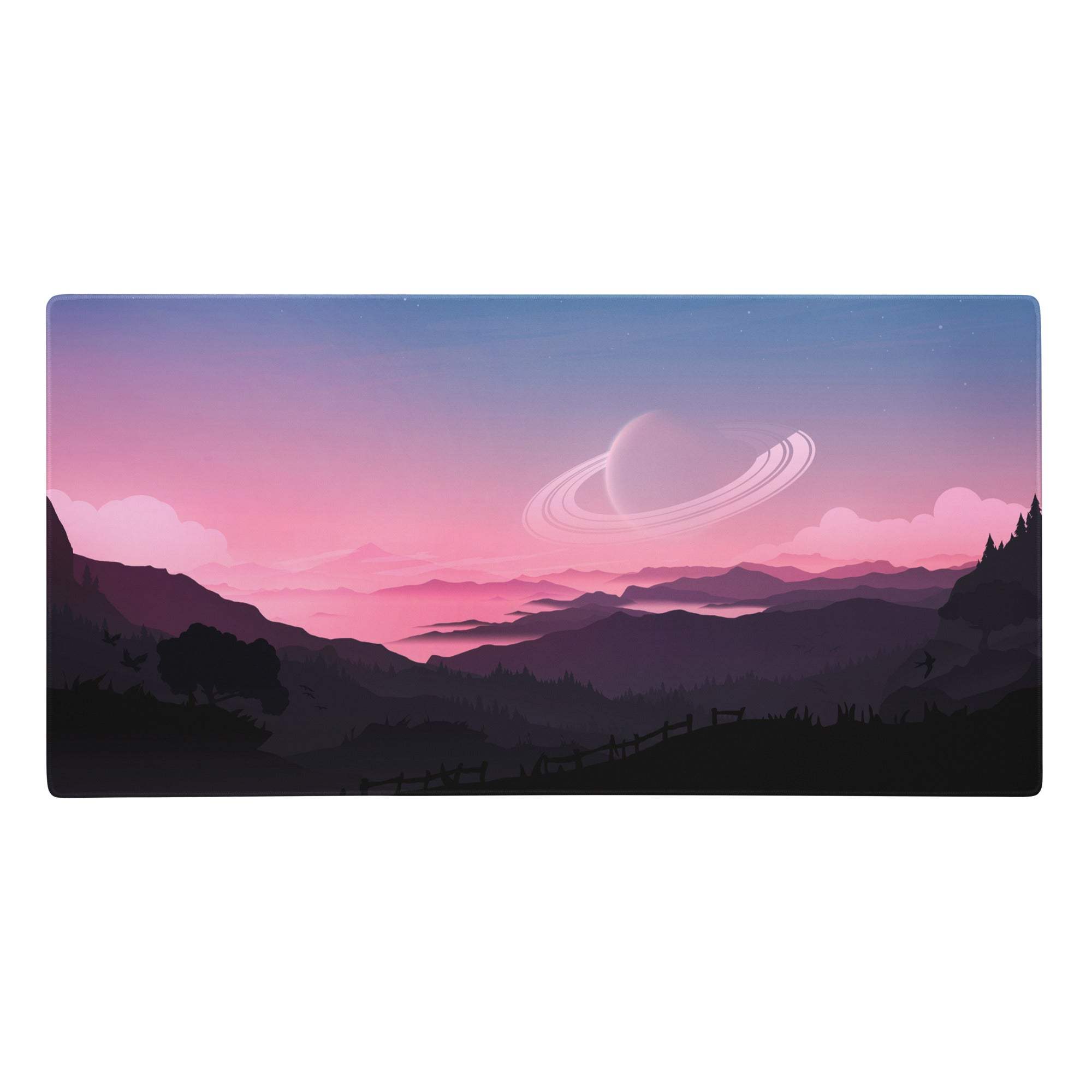 Rectangular gaming mousepad with a pink purple gradient featuring layered mountains and a glowing ringed planet