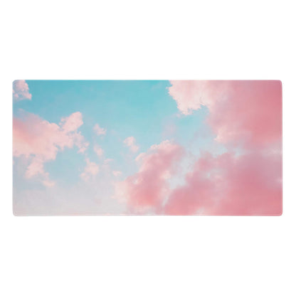 Pastel sky mouse pad featuring a non slip rectangular mat with pastel pink and blue sky and fluffy clouds design