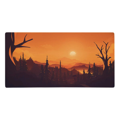 Rectangular gaming mousepad with stylized orange sunset forest landscape featuring pine trees and mountains for desk use