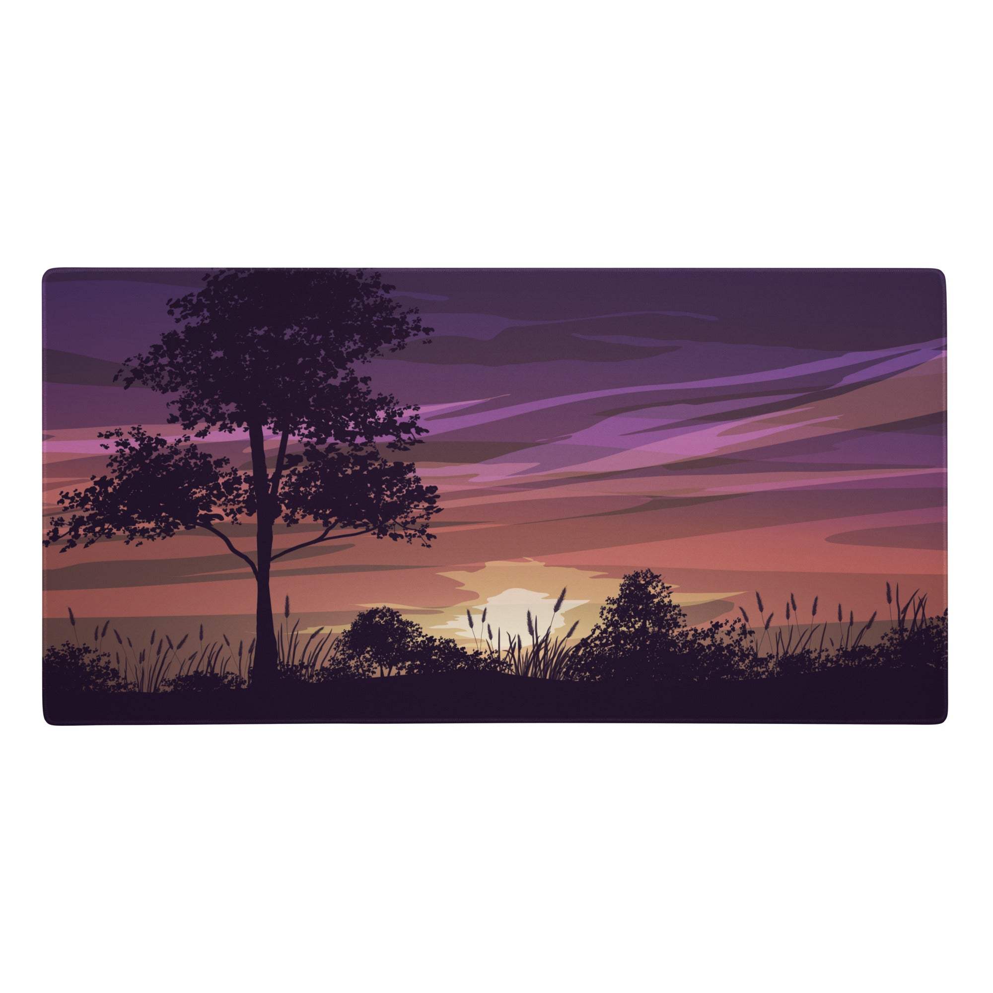 Purple and pink sunset vista desk pad featuring a silhouetted tree against layered gradient sky for modern decor
