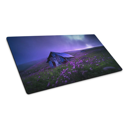 Purple twilight stormy landscape gaming mouse pad with rustic cabin and flowers