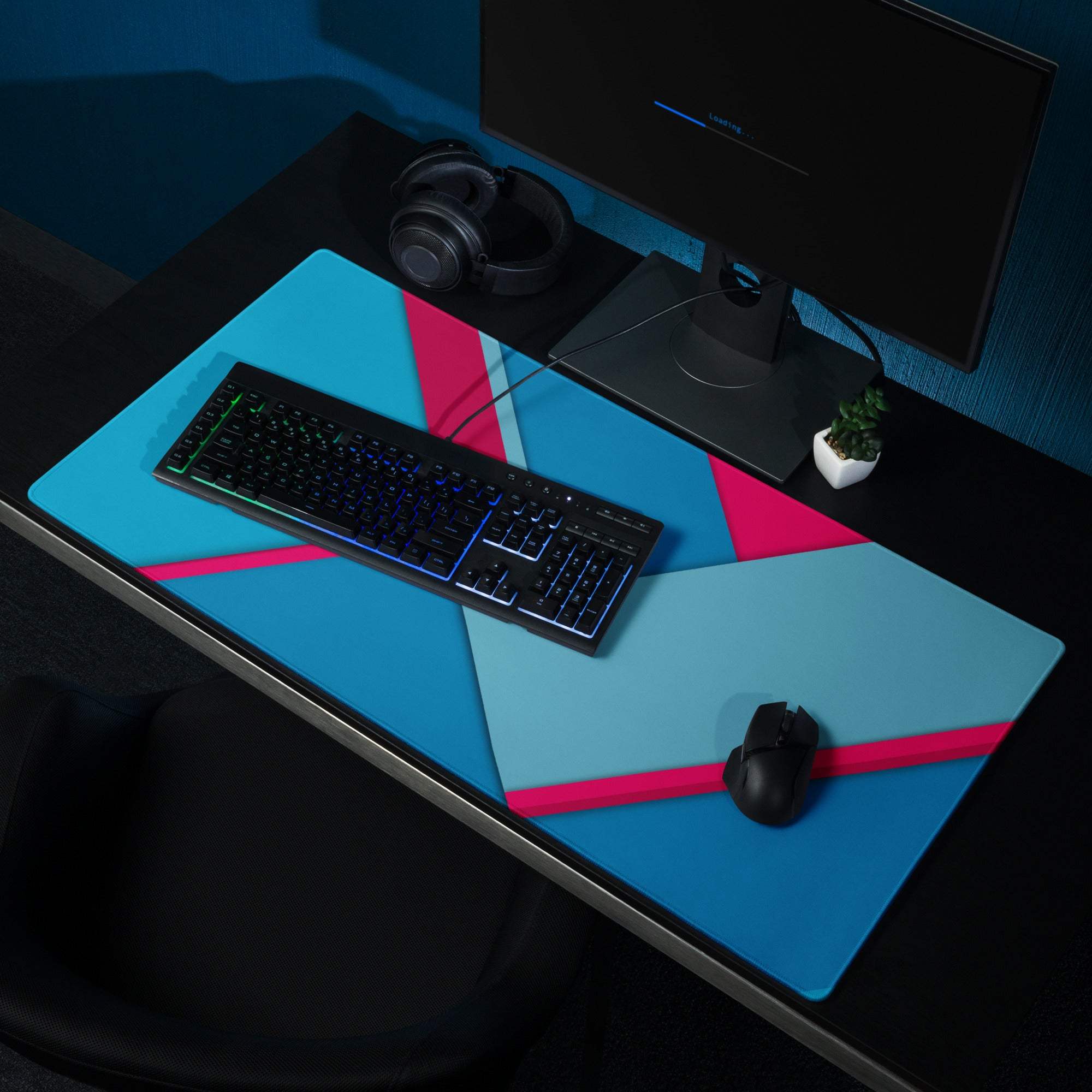 Large geometric blue pink gaming mouse pad with non-slip base and stitched edges
