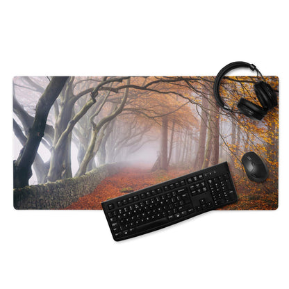 Large nature-inspired autumn forest path gaming mouse pad with misty scene