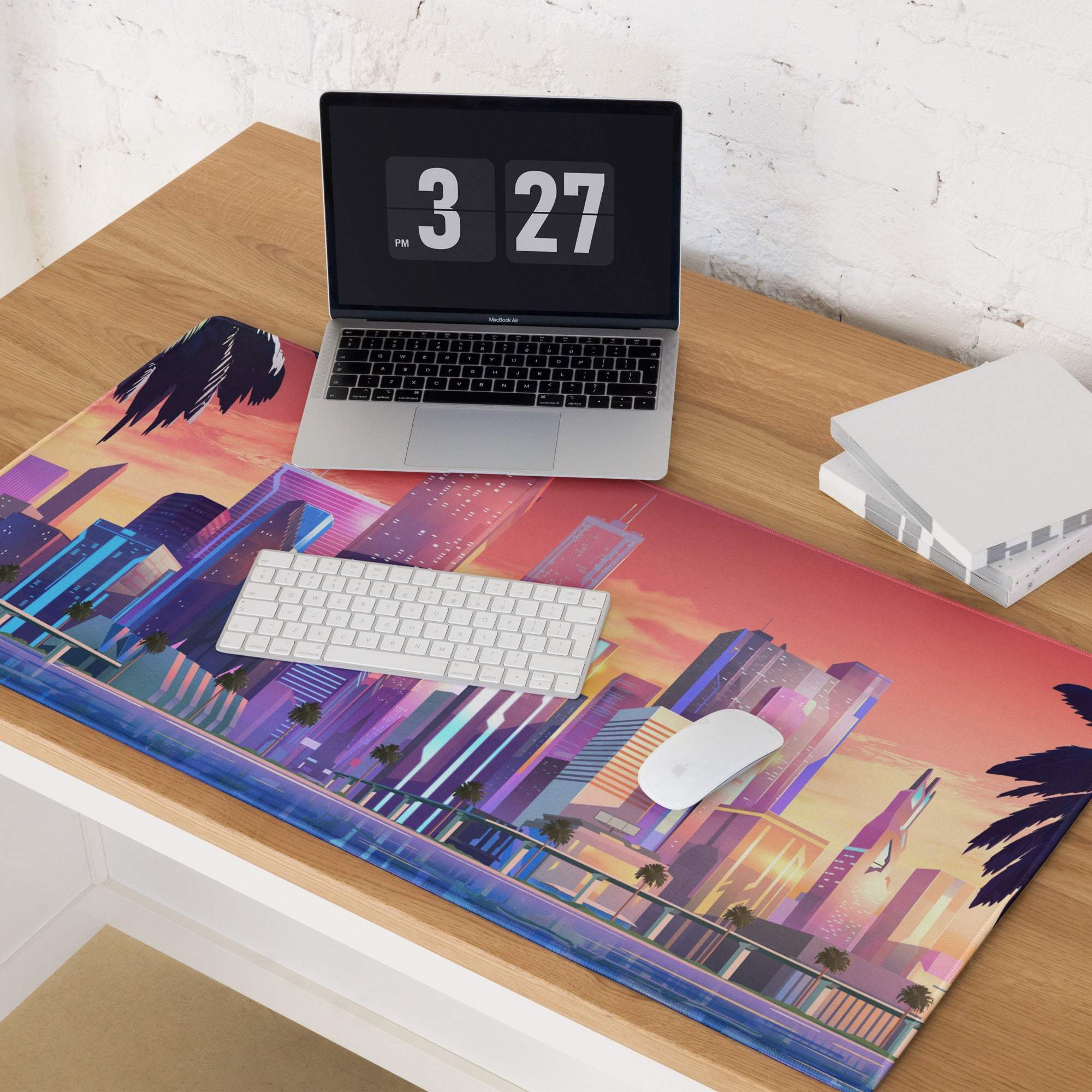 Sunset cityscape gaming mouse pad with vibrant purple-pink-orange gradient, skyscrapers, palm trees, non-slip base, stitched edges, large size