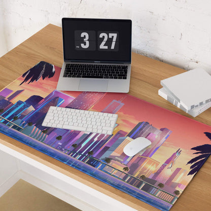 Sunset cityscape gaming mouse pad with vibrant purple-pink-orange gradient, skyscrapers, palm trees, non-slip base, stitched edges, large size