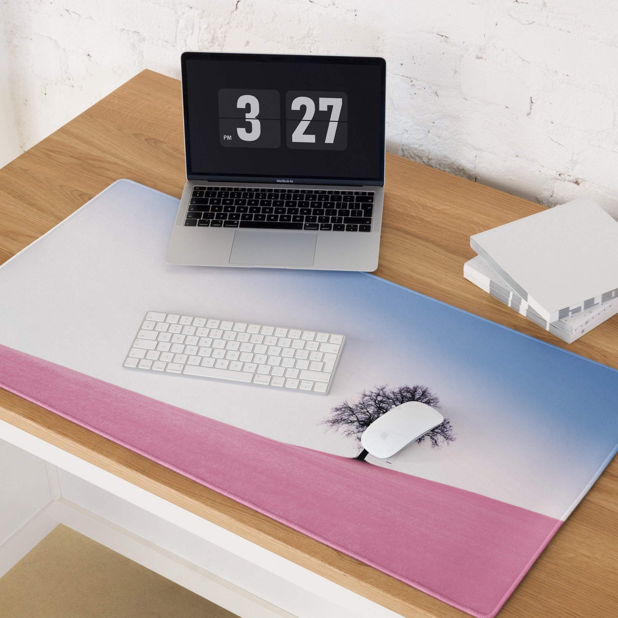 Large pastel pink gradient landscape gaming mouse pad with tree silhouette