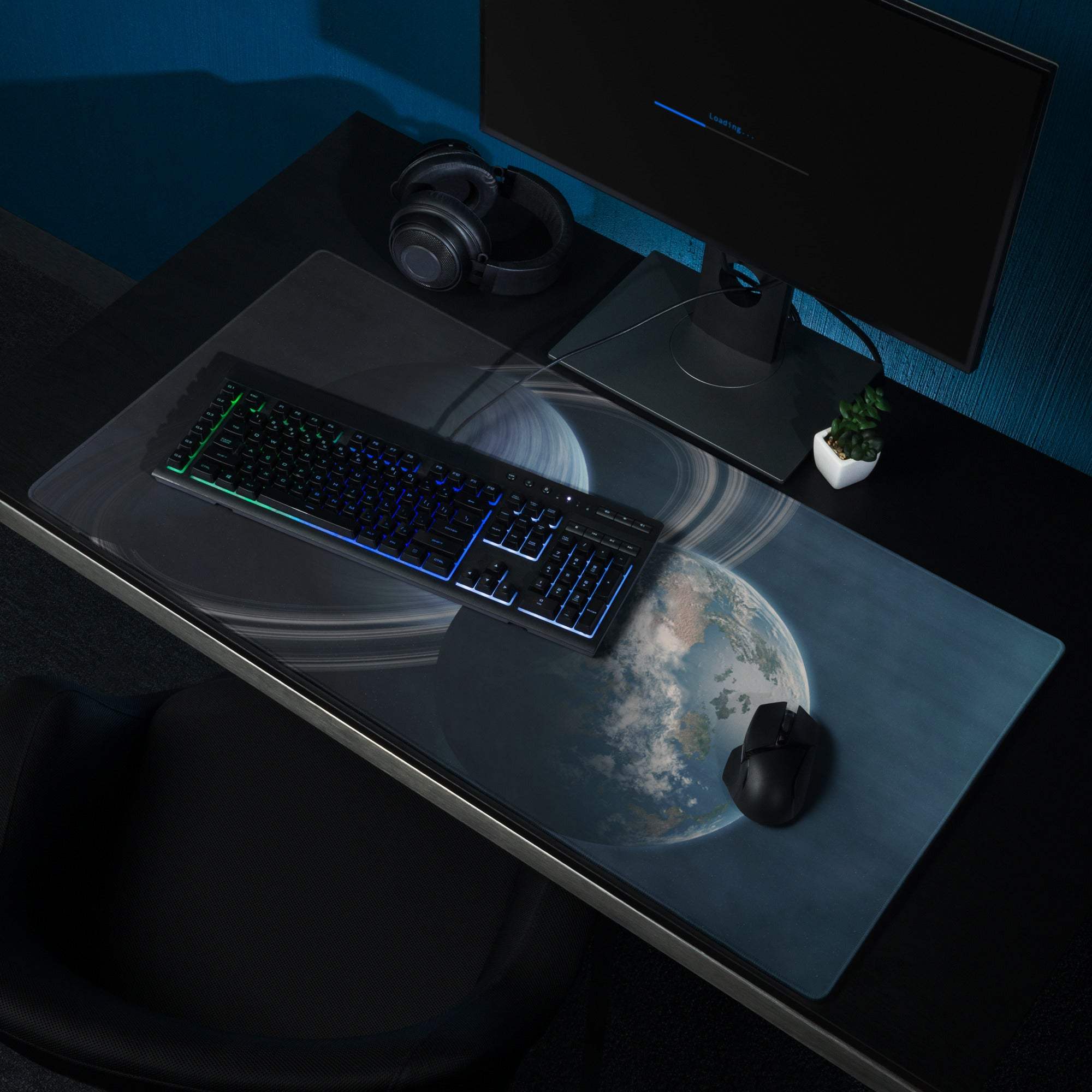 Sleek dark blue cosmic earth gaming mouse pad with clouds, rings, non-slip base
