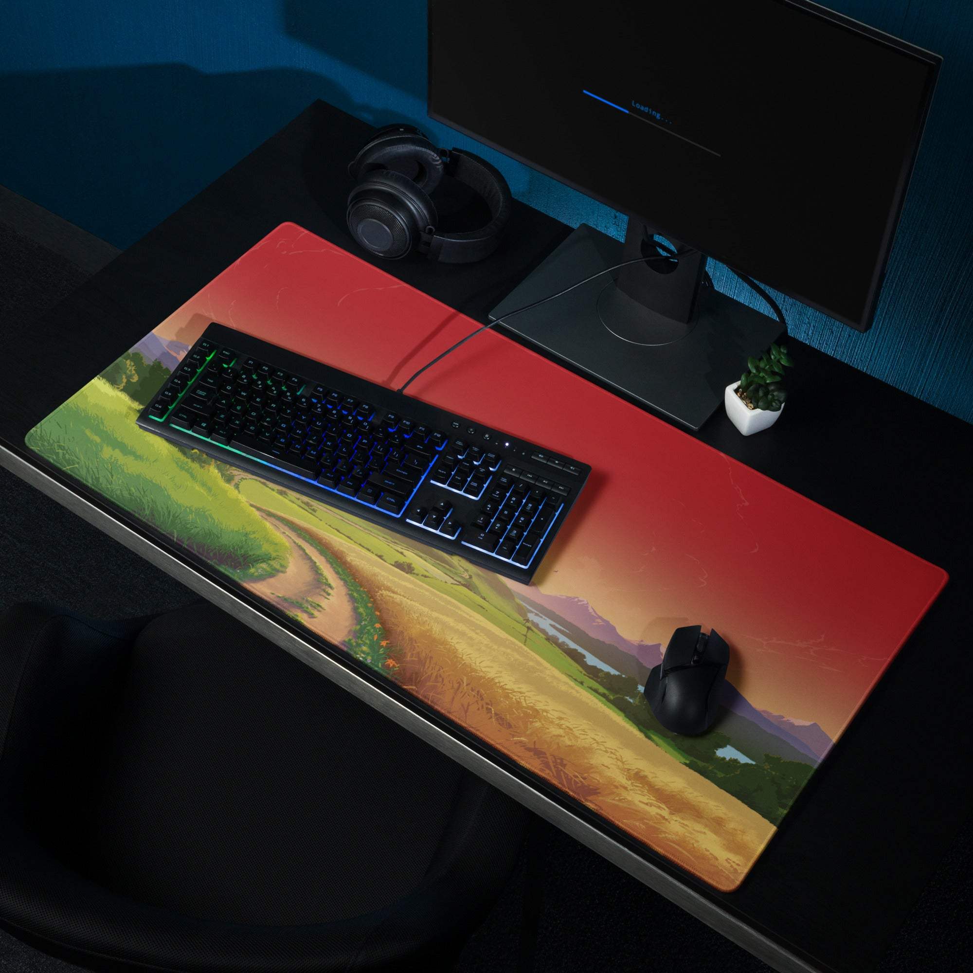 Vibrant sunset landscape gaming mouse pad with large surface, stitched edges, non-slip base