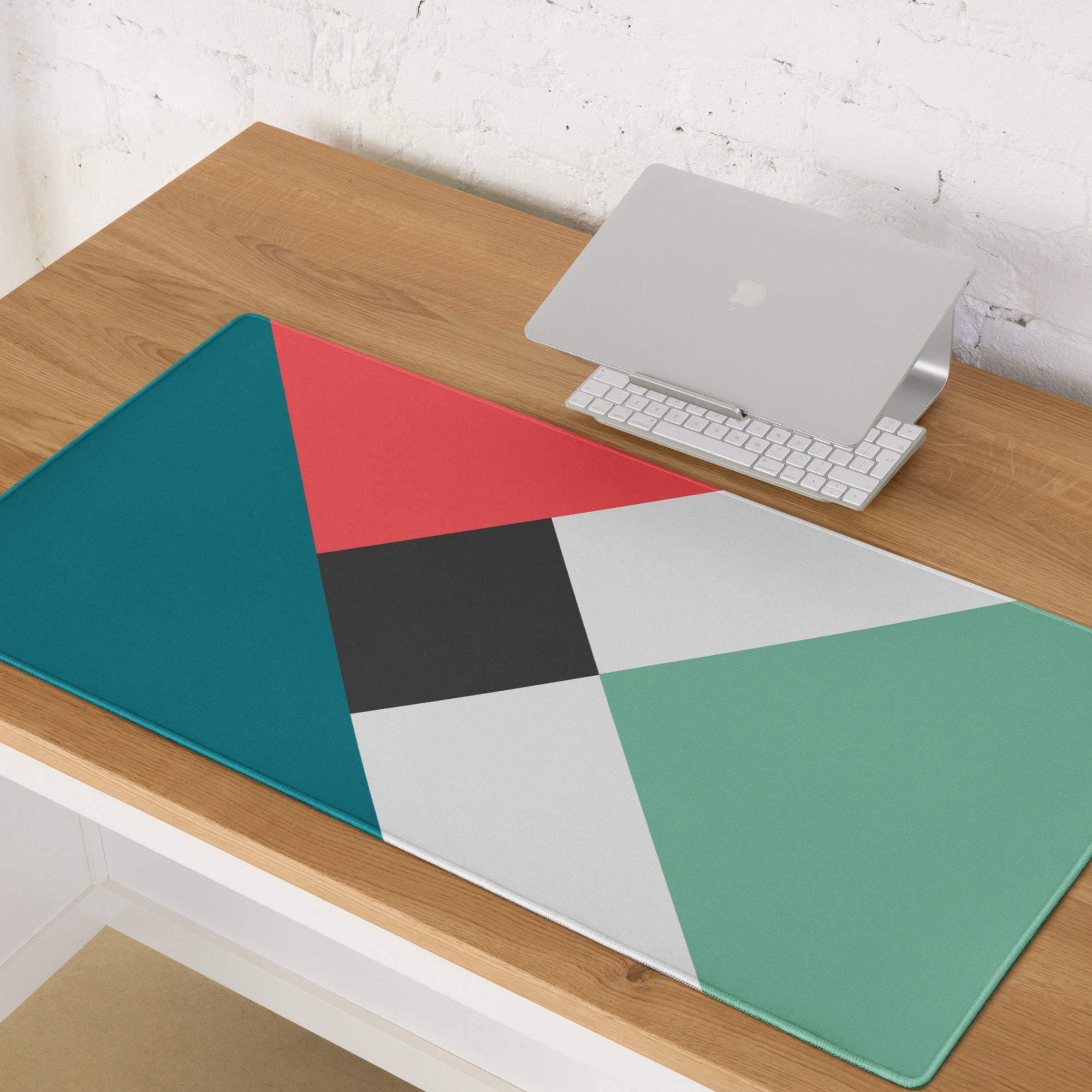 Geometric multicolor gaming mouse pad with teal coral mint triangles