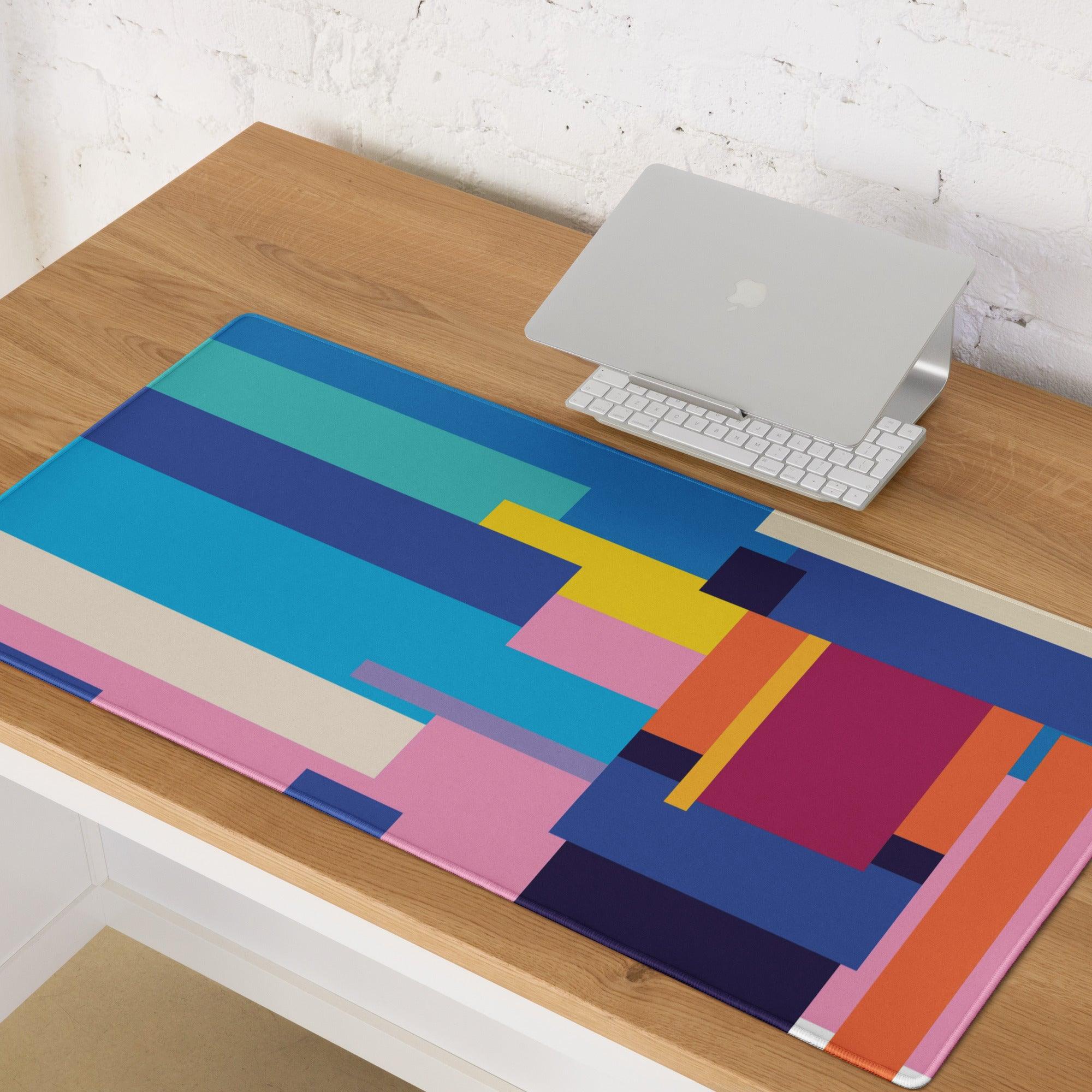 Vibrant geometric gaming mouse pad with bold blue pink yellow orange stripes