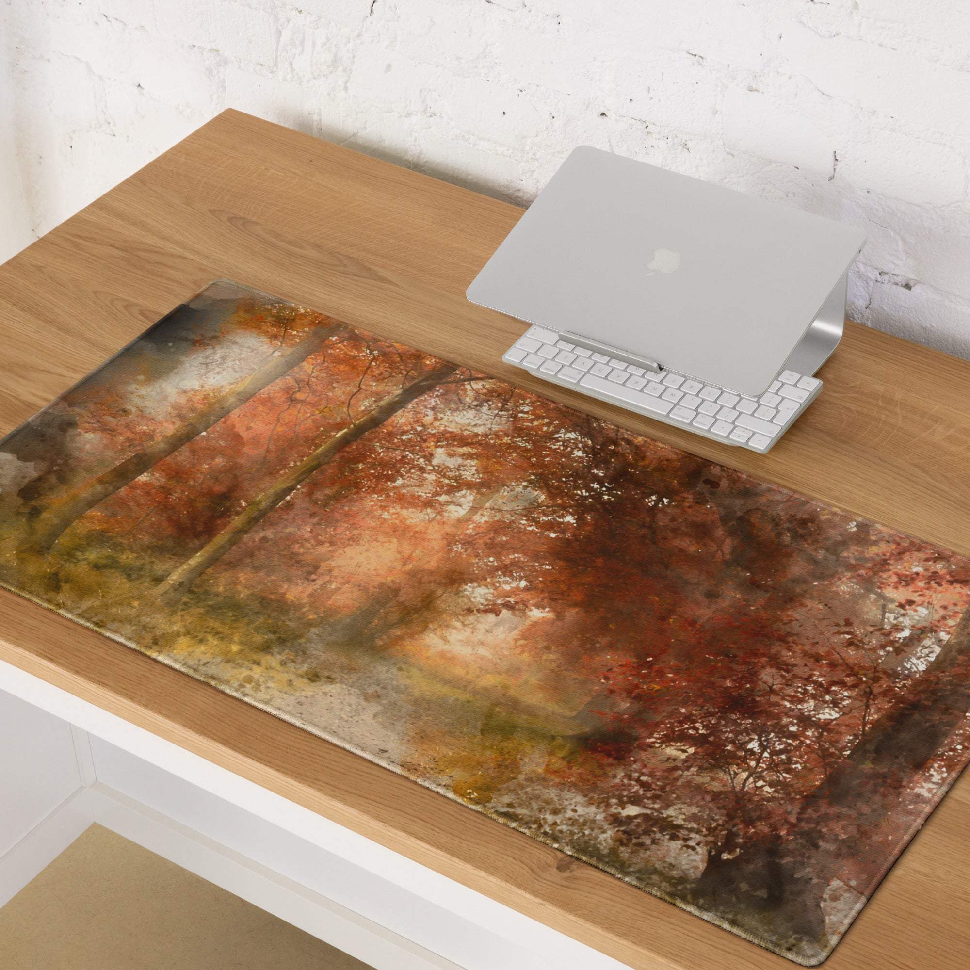Large watercolor autumn forest path gaming mouse pad with warm browns, oranges, non-slip base