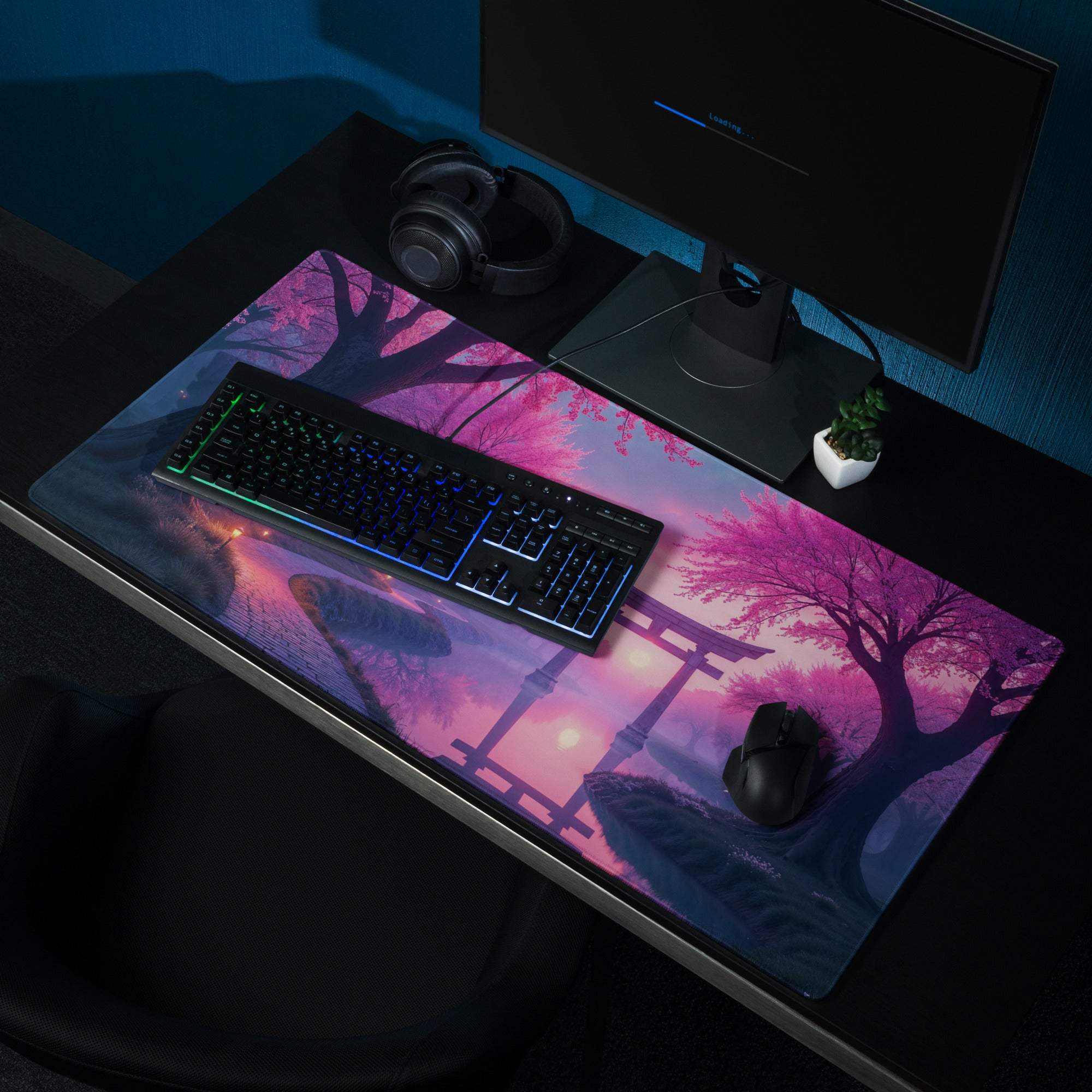Dreamy purple pink cherry blossom gaming mouse pad with torii gate under RGB keyboard