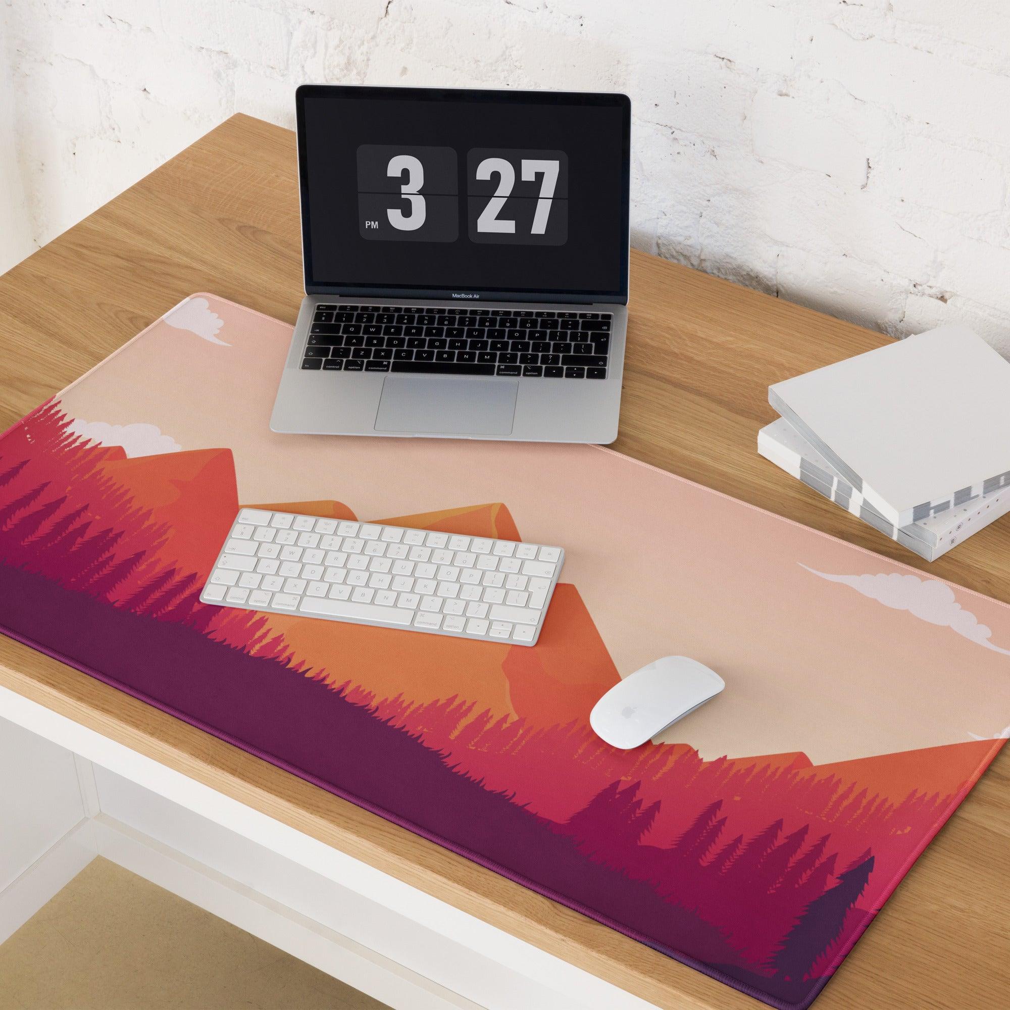 Sunset mountain gradient gaming mouse pad with orange magenta peaks, trees, non-slip backing