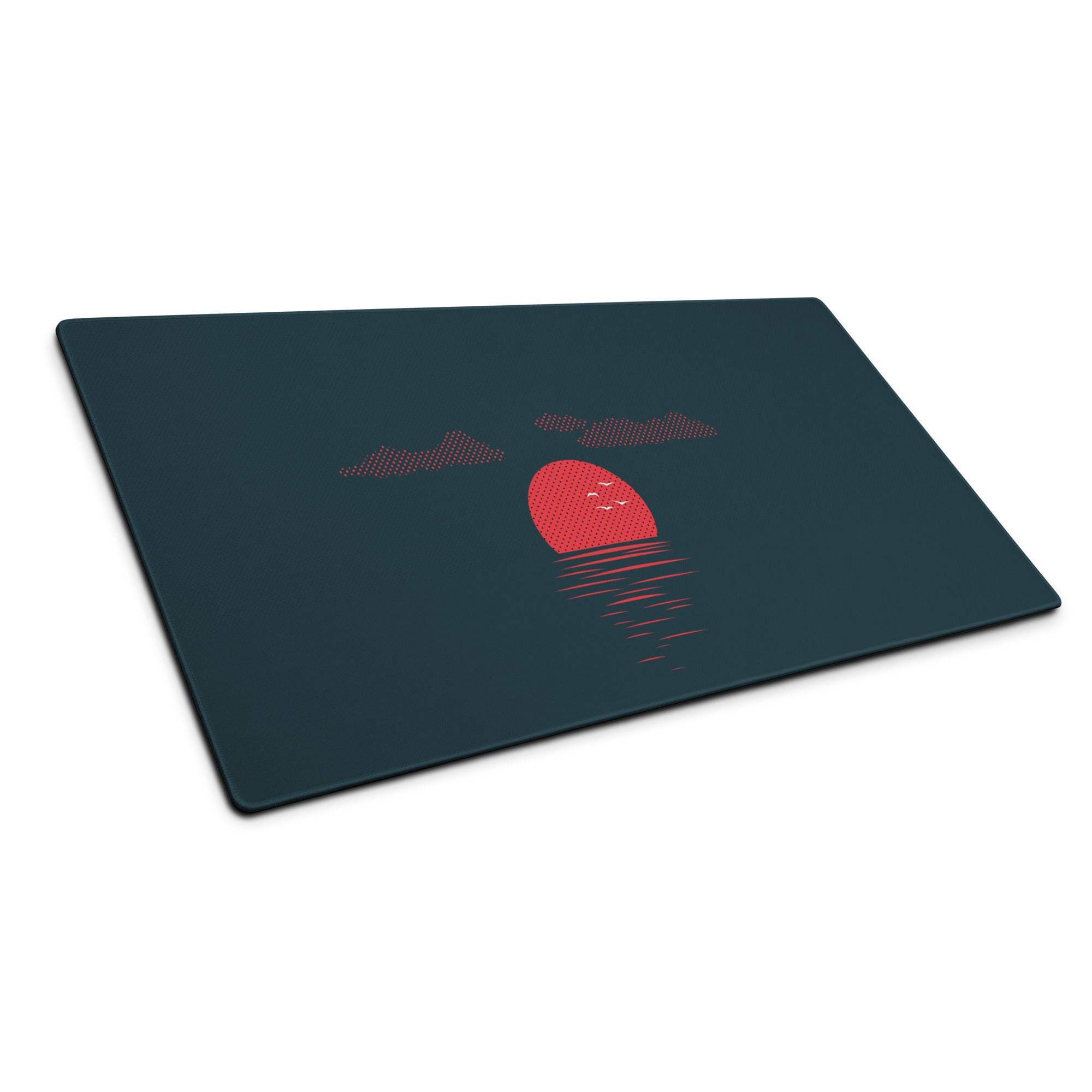 Dark teal cutting board with red sunset over water, dotted clouds