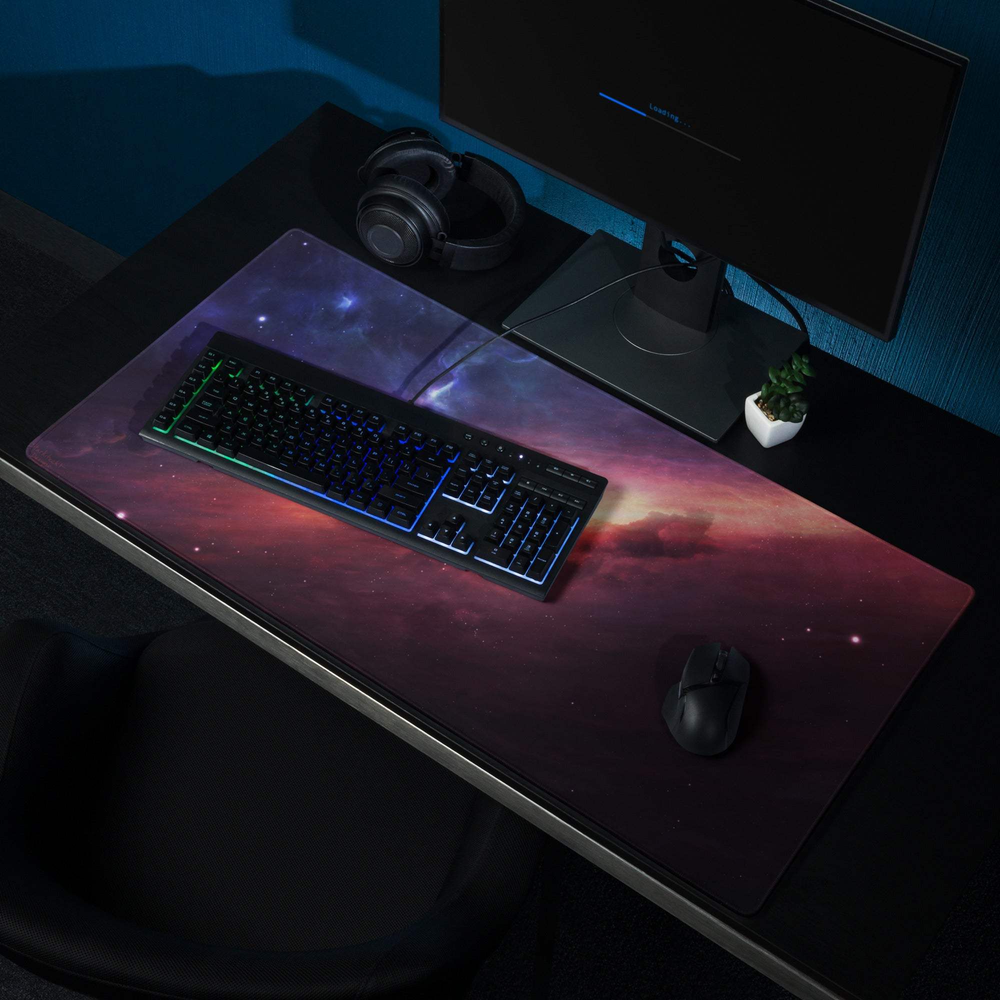 Vibrant cosmic nebula gaming mouse pad with edge stitching, non-slip base