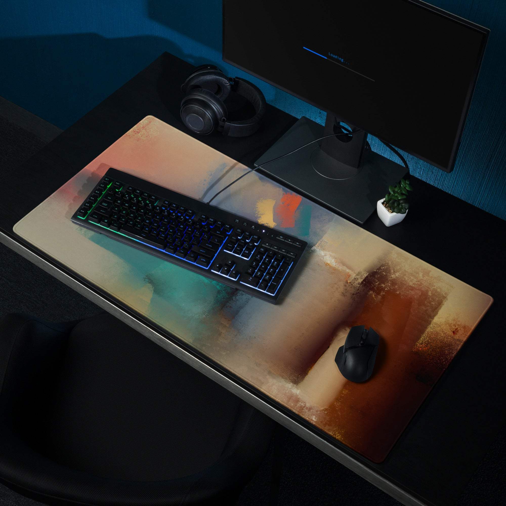 Large abstract art gaming mouse pad with vibrant orange teal brown gradient, non-slip base