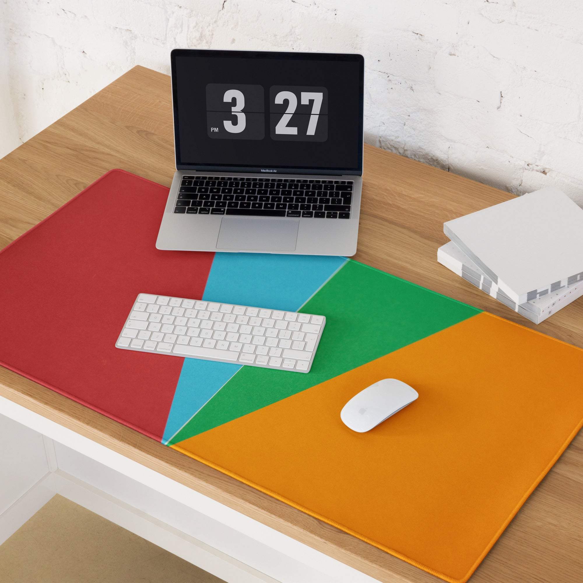 Vibrant abstract geometric color blocking mouse pad with red blue green orange sections